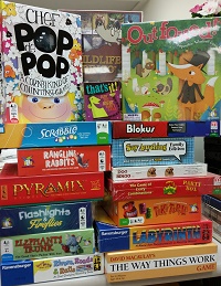 Photo of two large stacks of board games