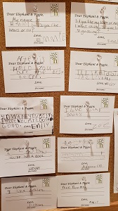 Postcards to Elephant and Piggie Photo of a bulletin board with postcards on it