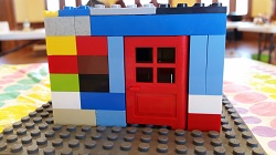 Photo of a house made of lego bricks by a child