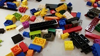 Photo of a small pile of multicolored lego bricks
