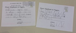 Photo of two postcards written by a child