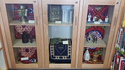 Photo of Ramadan items on display in a glass doored cabinet
