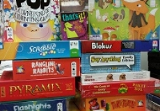 Photo of two large stacks of board games