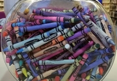 Guess How Many Crayons Photo of a glass fishbowl filled with crayons