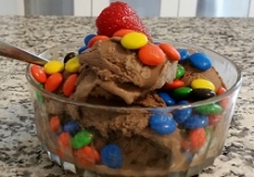 Ice Cream Photo of a bowl of chocolate ice cream with M and M candies on it