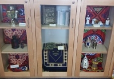 Photo of Ramadan items on display in a glass doored cabinet