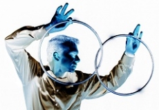 Abstract photo of a man holding two rings